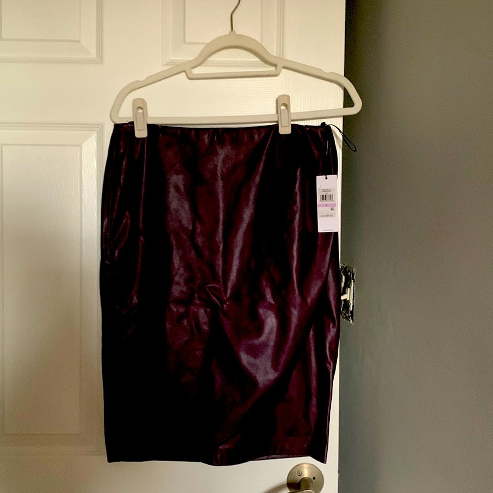 NWT draped faux leather pencil skirt in oxblood/dark purple. Size 6.